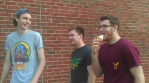 Sophomore member Michael Kern and junior members Ben Wagner and J.T. Henderson stroll past Forrer, Henderson with Caf ice cream in hand.