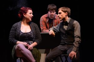 Del Grosso (right,) Haley Smallwood (left,) and Drew Hauke (center)acting in "Trust," produced by the Theater Department in 2012.