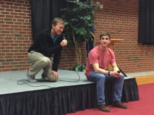 Sophomore Resident Advisor Justin Garagnani serenades his fellow resident advisor, junior Charlie Tancula, who does not seem impressed. 