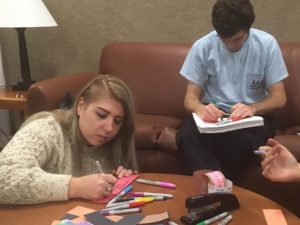 Jessica Taylor '17 and Daniel Cooper '19 make their own links of hope