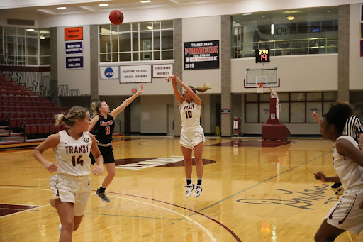 Women’s Basketball Dominating Their Season: A Recap of Their Recent Game Against Manchester